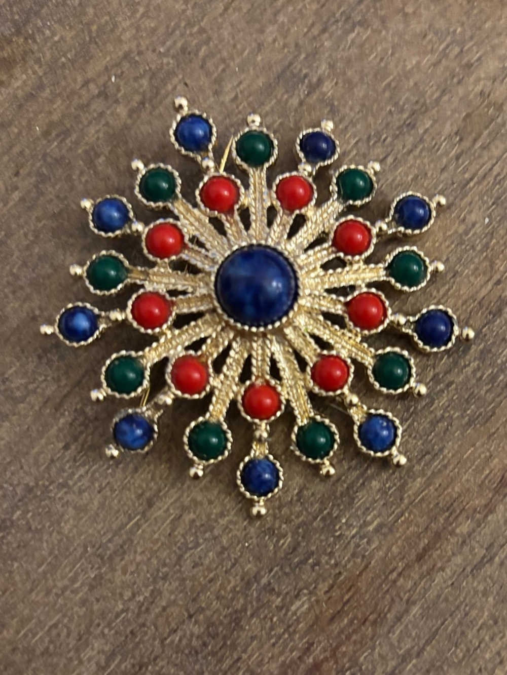 Sarah Coventry Gold-Tone Sunburst Brooch with Blue, Red & Green Cabochons